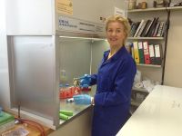 Figure 2. Rebecca Phillips uses sterile techniques in the laboratory to quantify chemical and biological production of N<sub>2</sub>O and N<sub>2</sub>. 