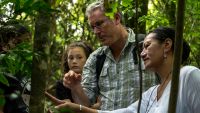 Robert Hoare talks about a moth seen in the field at Bushy Park with teacher Tiahuia Kawe-Small.