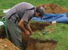 Pedologist Paul Mudge excavating a soil pit. Image - Alice Barnett