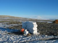 Field toilet at Marble Point with ice blocks to protect from the wind at other times we set it down behind large rocks. (Balks)