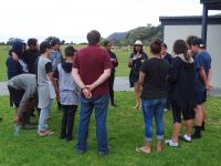 Teacher Kararaina Ngatai-Melbourne explaining the Web of Life lesson in Te Reo
