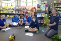 Robinne Weiss explaining to Heathcote Valley School students (Kahikatea Team) that sorrel was traditionally eaten but is now considered a weed. Photo: Murray Dawson