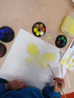 Shotover Primary School students using their observation skills painting moths. Image - Emma Watts.
