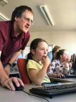 Murray Dawson helping Kaniere School students explore their iNaturalist NZ project