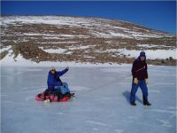 Every morning we trekked out across the ice of Lake Wellman to access the soils at the head of the lake. Sometimes we hitched a ride on the sled. (Aislabie)