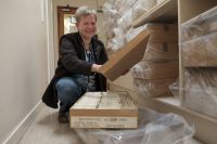 Herbarium manager Ines Schonberger with boxes of specimens