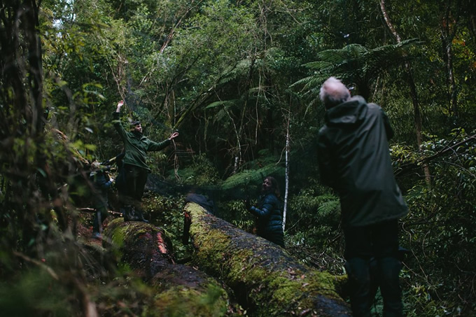 Dave Bryden (left) and conservation volunteers securing the mist net