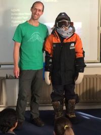 Phil with one of the Russley High students, attired for a trip to Antarctica 